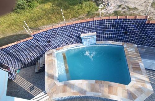 Itanhaem Casa | Casa com piscina , churrasqueira, Wi-Fi, em rua de Areia à 1km da praia, bairro sussegado, proíbido uso de som extremamente alto ideal para descansar