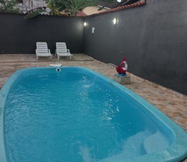 Peruibe Casa | Casa com piscina em condomínio fechado