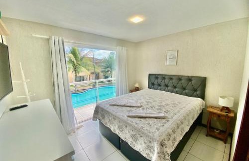 Ossos Apartamento | Casa com piscina em condomínio na Rasa