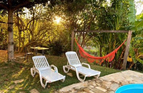 Ijaci Casa | Casa com piscina fundo pra represa e AR Condicionado CasinhaBrancaDeVaranda