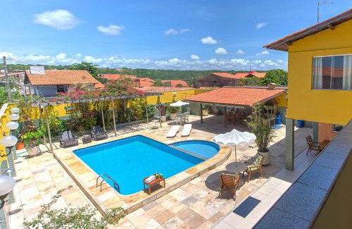 Jacauna Casa | Casa com Piscina na Praia do Iguape by Carpediem