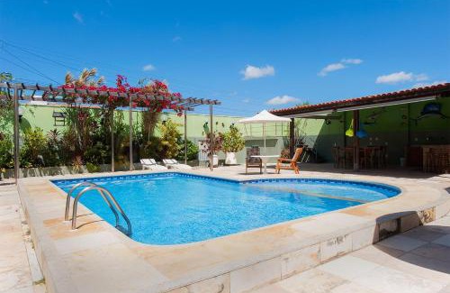 Jacauna Casa | Casa com Piscina na Praia do Iguape by Carpediem