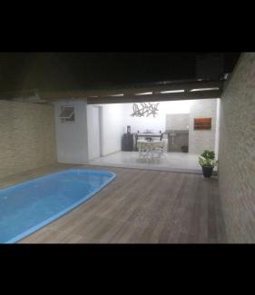 Centro Casa | Casa com piscina próxima ao Mar