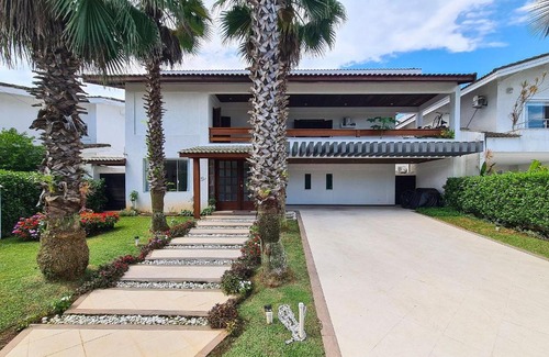 Jardim Acapulco Casa | Casa com piscina, varanda e lazer em condomínio