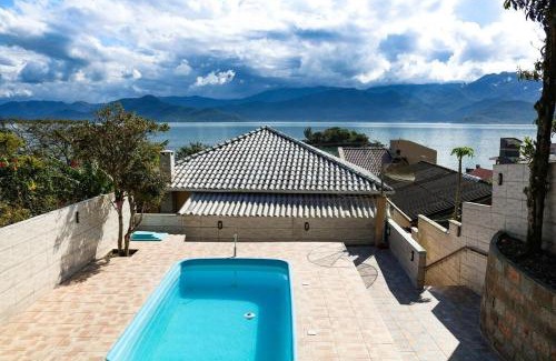 Caiacanga Casa | Casa com piscina vista mar por do sol