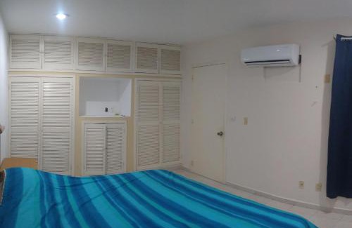 Tuxtla Gutiérrez Casa | Casa con aire acondicionado en habitación