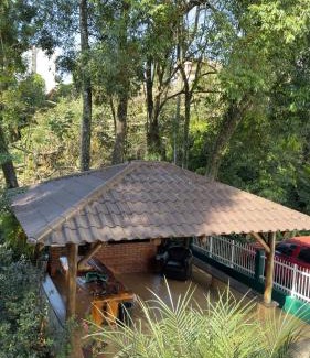 Piratuba Casa | Casa das Bromélias- 2 Quartos climatizados -Casa com Quiosque em meio à natureza!