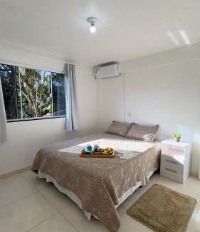 Piratuba Casa | Casa das Bromélias- 2 Quartos climatizados -Casa com Quiosque em meio à natureza!