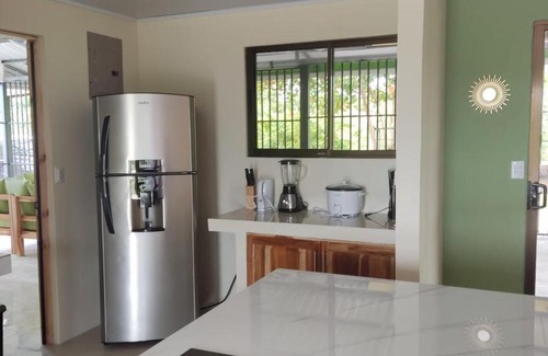 Parrita Casa | Casa de Amigos