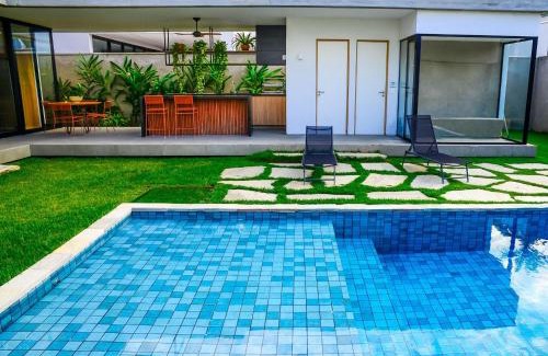 Jardim Acapulco Casa | Casa de Cinema no Guarujá - Condomínio Acapulco