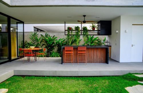 Jardim Acapulco Casa | Casa de Cinema no Guarujá - Condomínio Acapulco
