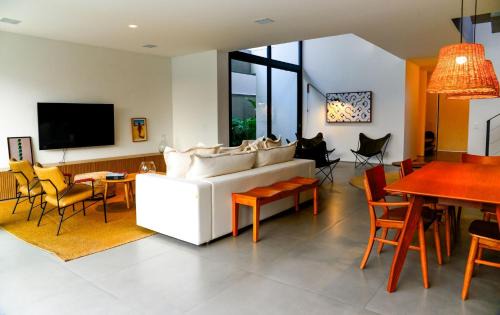 Jardim Acapulco Casa | Casa de Cinema no Guarujá - Condomínio Acapulco