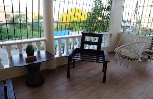 Mendoza Casa | Casa de dos niveles de concepto abierto en Santo Domingo Este. .