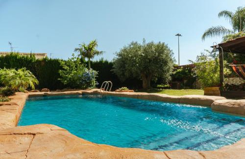 Los Alcázares Casa | Casa de madera con piscina privada