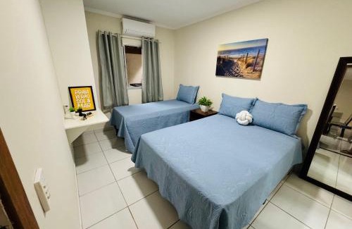 Praia do Morro Apartamento | Casa de Praia com Piscina, quintal, lazer e churrasco, 3 quartos com ar condicionado, sendo 2 suites para sua familia!