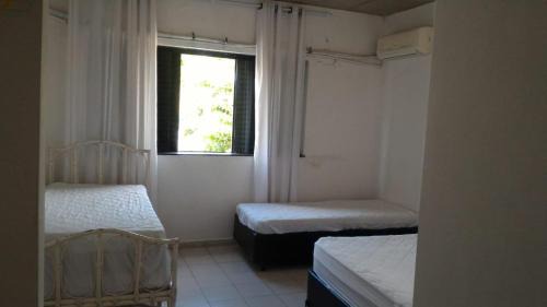 Jardim Virginia Casa | Casa de praia Enseada