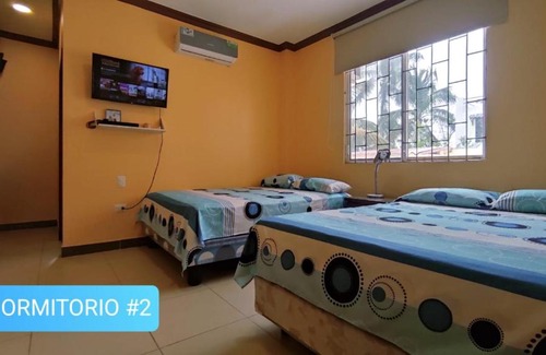 Data de Villamil Casa | Casa deluxe con piscina y salida directa a la playa en general villamil playas ecuador