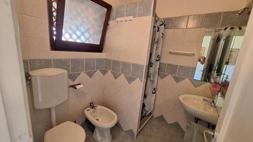 Porto Pollo Apartamento | Casa di Lu' - Bilocale con giardino - Porto Pollo