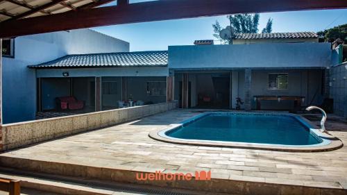 Areal Casa | Casa em Araruama com piscina e perto da praia