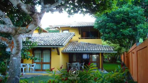 Arraial d'Ajuda Casa | Casa em Arraial D'ajuda - Praia do Mucugê - Bahia - 40mts da praia - Ar condicionado - Churrasqueira - Smart Tv - Wifi - Piscina - Vaga para carro