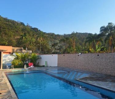 Caiubura Casa | Casa em Bertioga com piscina aquecida