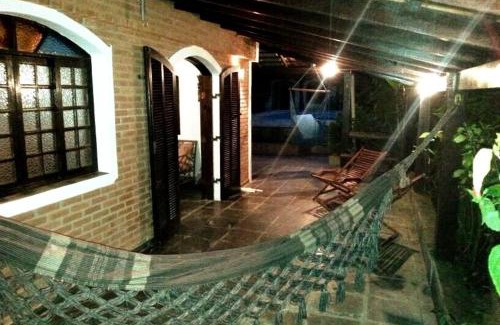 Morada da Praia Casa | Casa em Bertioga no Cond Morada da Praia com piscina