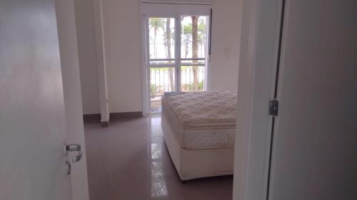 Santos Casa | Casa em condomínio frente mar