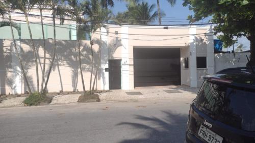 Santos Casa | Casa em condomínio frente mar