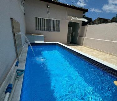 Tupy Casa | Casa em Itanhaém com Piscina e Ar condicionado à 900 Metros da Praia