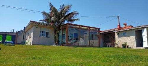 Razo da Costa Casa | CASA EN PLAYA DE RAZO CON JARDIN Y VISTAS AL MAR