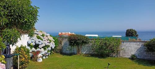 Razo da Costa Casa | CASA EN PLAYA DE RAZO CON JARDIN Y VISTAS AL MAR