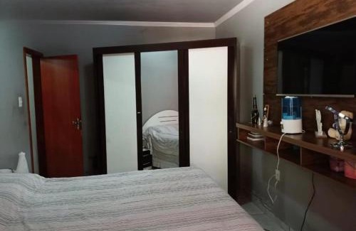 Castanheira Casa | Casa Espaçosa com 3 Suítes, Jardim e Hidromassagem Privativa