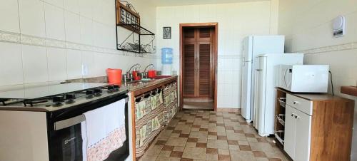 Mangaratiba Casa | Casa espaçosa pé na areia