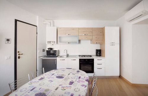 Cassone Apartamento | Casa Giuditta-Apartamento en el centro histórico de Cassone, Casa Giuditta - Appartamento nel centro