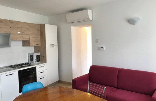 Cassone Apartamento | Casa Giuditta-Apartamento en el centro histórico de Cassone, Casa Giuditta - Appartamento nel centro