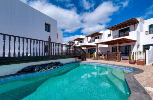 Punta Mujeres Casa | Casa Hibiscus - Shared Pool and BBQ - Close to Seafront Promenade By Lanzarote Vacation Homes