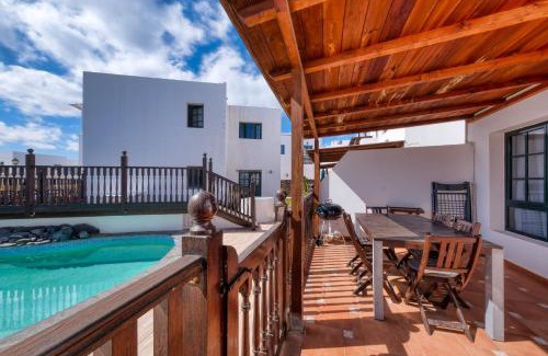 Punta Mujeres Casa | Casa Hibiscus - Shared Pool and BBQ - Close to Seafront Promenade By Lanzarote Vacation Homes