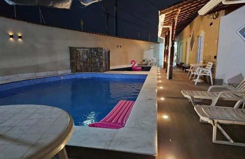 Jardim Real Casa | Casa Lindíssima e Espaçosa com 2 Piscinas - Adulto e Infantil, Perto da Praia, Opção da Piscina Adulto Aquecida Cobrado à Parte, 4 Quartos Frente as Piscinas, Área Gourmet Completa com Churrasqueira, Forno e Fogão a Lenha, Mesa de Bilhar, Lareira na Sala
