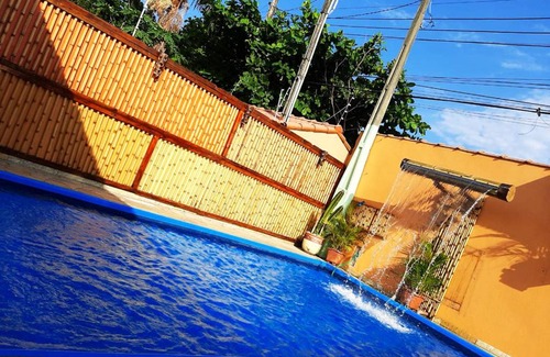 Jardim Santa Tereza Casa | Casa linda com Piscina e Jogos, pertinho da Praia