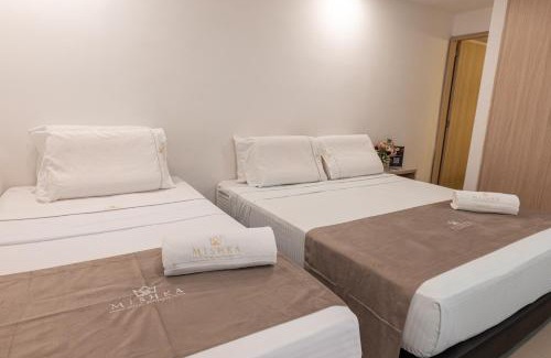 Manga Casa | Casa Mishka Hotel Boutique Habitación #105 Nuevo Cartagena