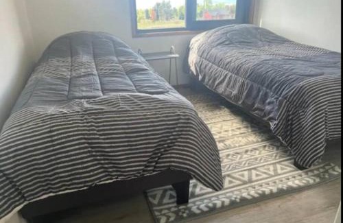Pucon Casa | Casa nueva en country pucon con piscina y quincho compartido con casa gemela
