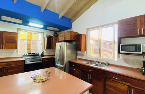 Corozal Villa | Casa Paradise contiguo a la playa con piscina