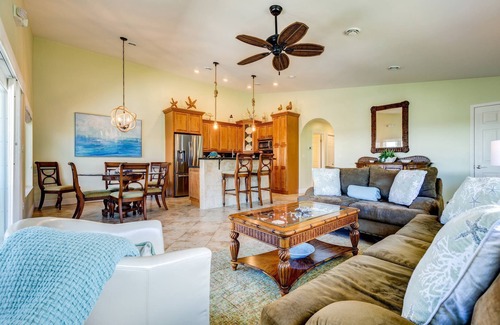 Coury Casa | Casa Paraiso: Discover This Charming 2BR Canal Front Duplex in KCB with Private Pool & Dockage!