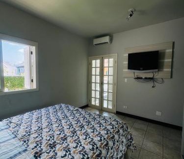 Jardim Acapulco Casa | Casa pet friendly Guarujá condomínio Jardim Acapulco