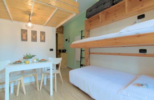 Aprica Apartamento | Casa Pino- Loft con giardino Magnolta
