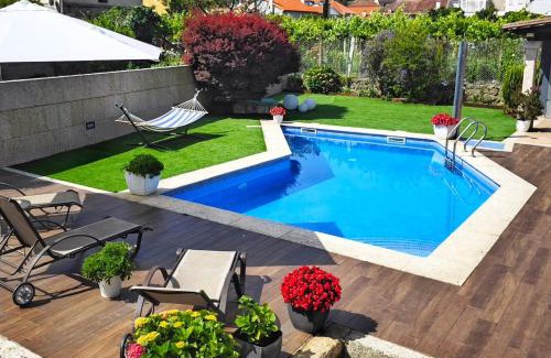 Combarro Casa | Casa piscina boleros