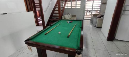 Jardim Neptunia Casa | Casa piscina pé na areia Bertioga