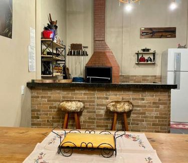 Morumbi Casa | Casa Rústica com piscina
