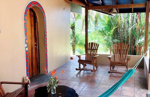 Pavones Casa | Casa Riviera- Walk to surf, tropical gardens, river access