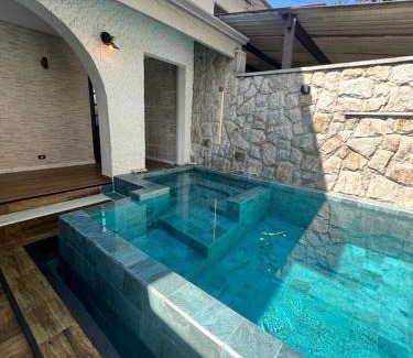 Santos Casa | Casa Santos Piscina e Praia